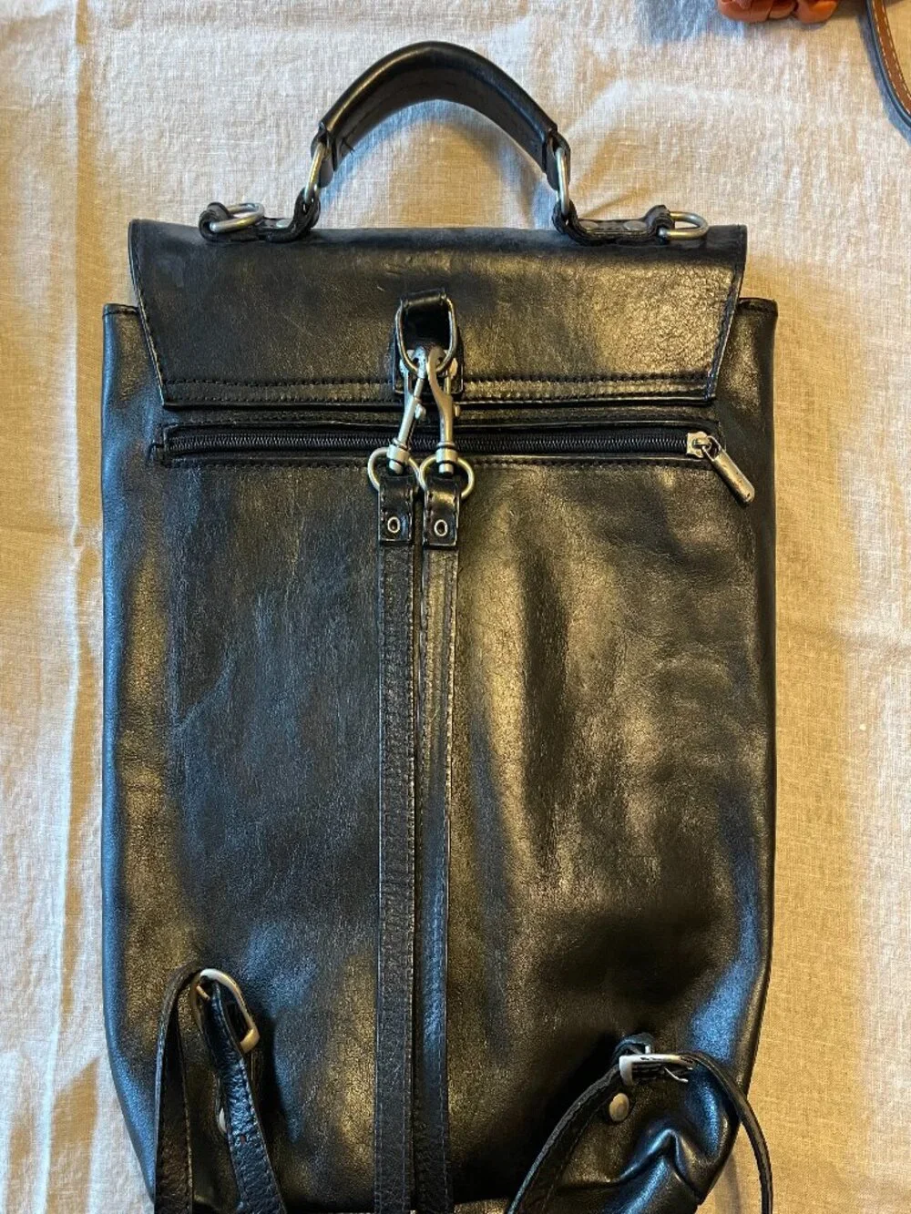 vintage black leather backpack